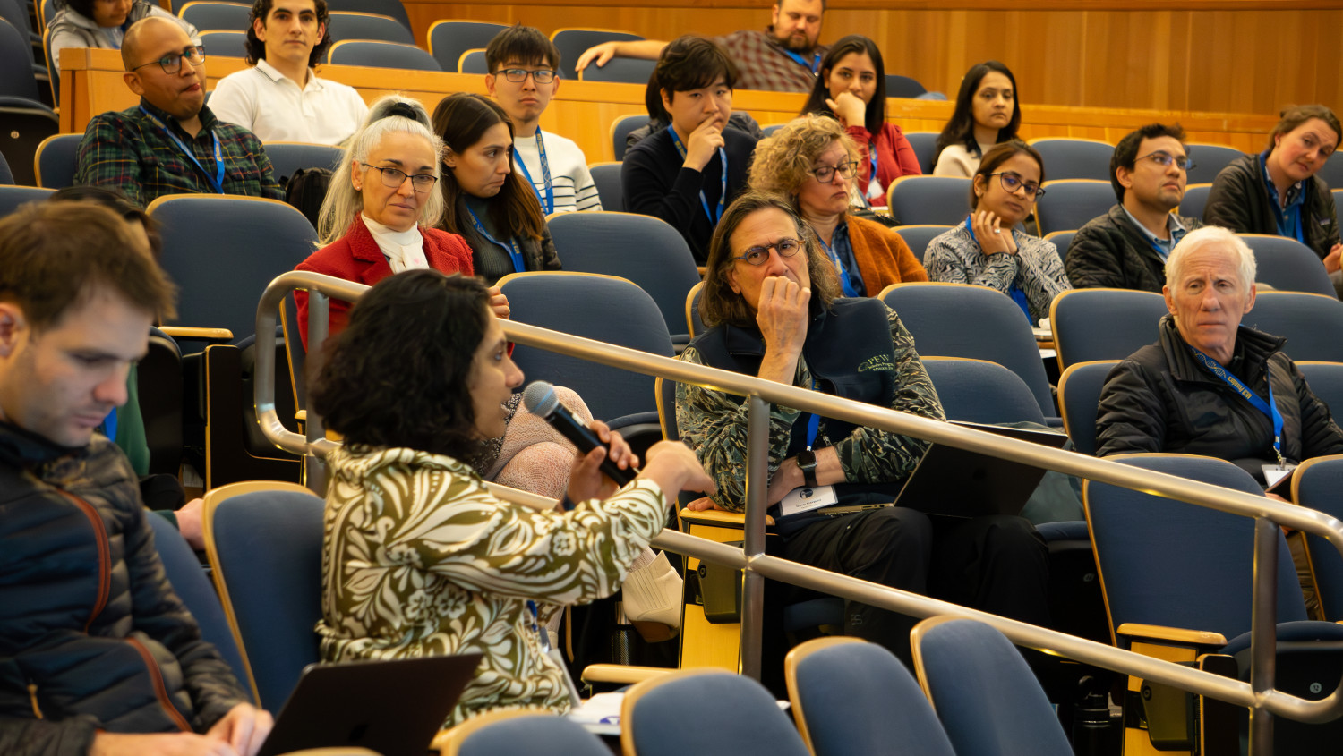 Postdocs and faculty engaged in the Q&A